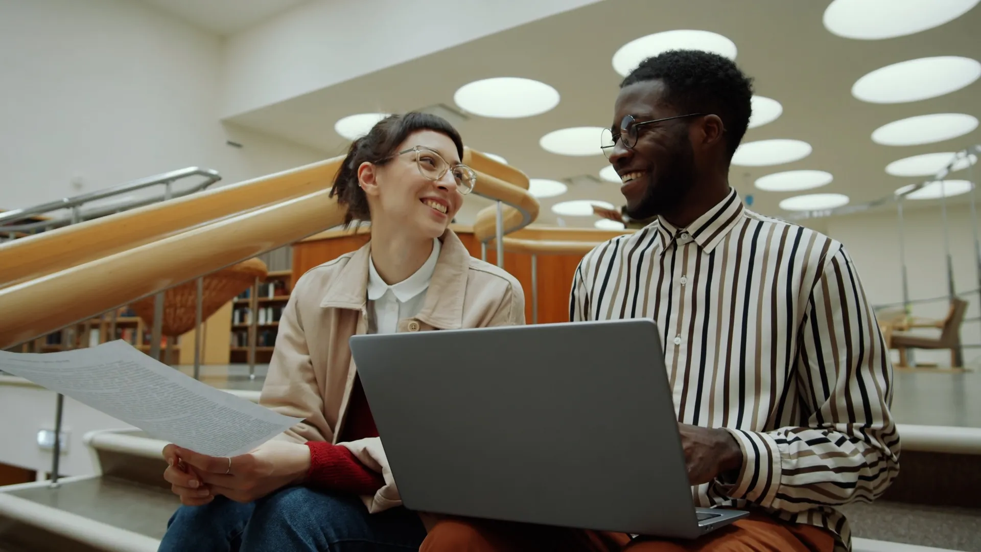 researchers sitting together and smiling